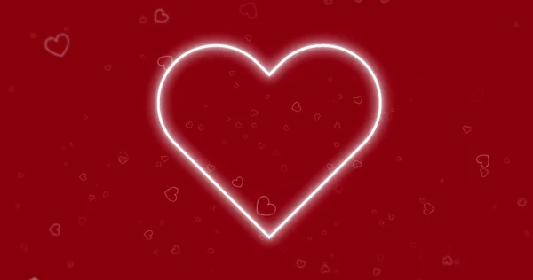 赤いハートのアイコンが浮かび 赤い背景にネオンハートのイメージ バレンタインデーロマンス愛の概念をデジタルで生成されたイメージ — ストック写真