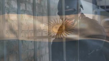 Silahlı askerler üzerinde Arjantin bayrağının canlandırılması. küresel vatanseverlik, silahlı kuvvetler ve koruma kavramı dijital olarak oluşturulmuş video.