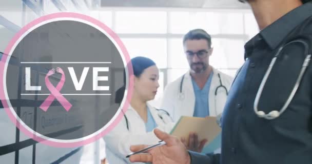 Animación Texto Amor Con Cinta Rosa Sobre Diversos Médicos Hospital — Vídeo de stock
