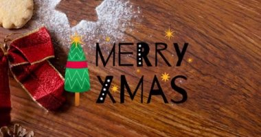 Ahşap arka planda neşeli noel mesajları ve ağaç animasyonu. Noel, gelenek ve kış kutlaması konsepti dijital olarak oluşturuldu.