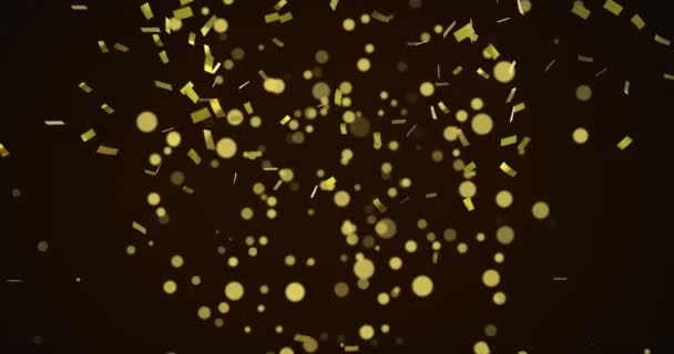 黒い背景に浮かぶ金色のコンフェッティのアニメーション 祭りの伝統とお祝いの概念デジタル生成されたビデオ — ストック動画