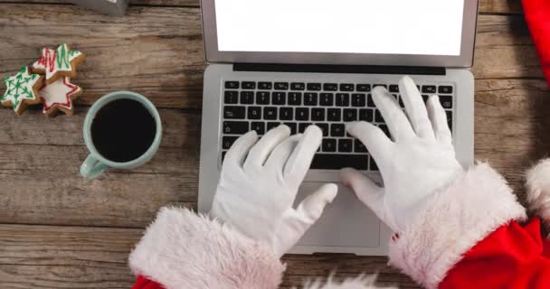 Animacja Świętego Mikołaja Przy Użyciu Laptopa Przestrzenią Kopiowania Świąteczne Ciasteczka — Wideo stockowe