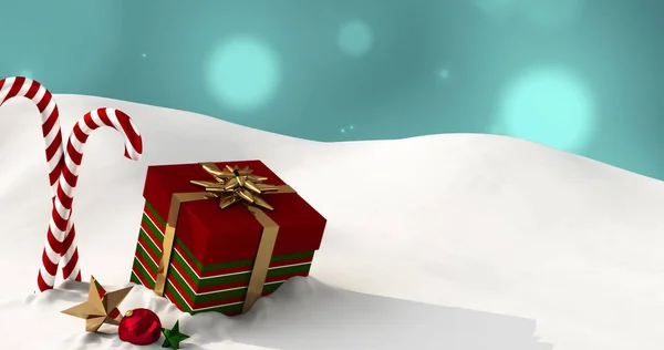 Bild Von Geschenken Und Weihnachtsbonbons Die Auf Schnee Liegen Mit — Stockfoto