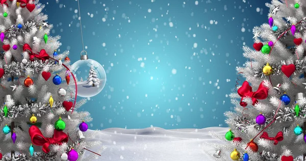 Twee Kerstbomen Opknoping Bauble Decoraties Tegen Sneeuw Vallen Het Winterlandschap — Stockfoto