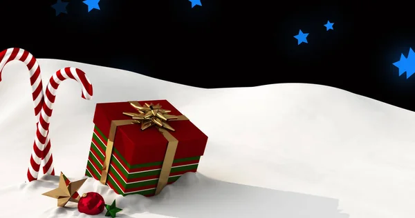 Imagen Regalos Caramelos Navidad Tumbados Nieve Con Estrellas Azules Cayendo —  Fotos de Stock