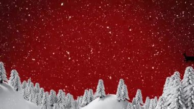 Kırmızı arka planda ağaçların üzerine düşen kar animasyonu