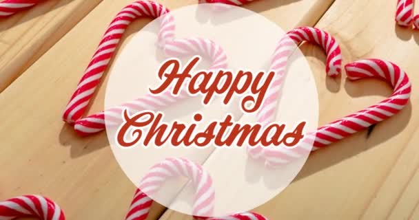 Animation Von Fröhlichen Weihnachtstexten Über Bonbons Auf Holzgrund Weihnachten Tradition — Stockvideo