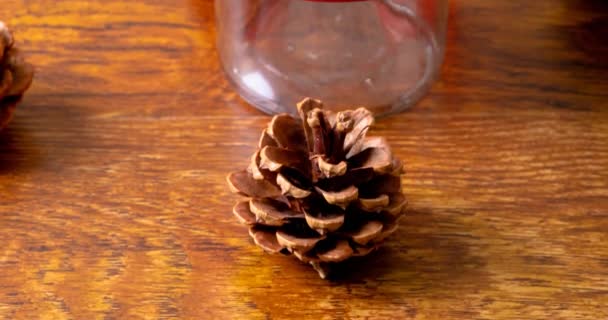 Composição Decorações Natal Com Doces Cones Pinheiro Fundo Madeira Natal — Vídeo de Stock