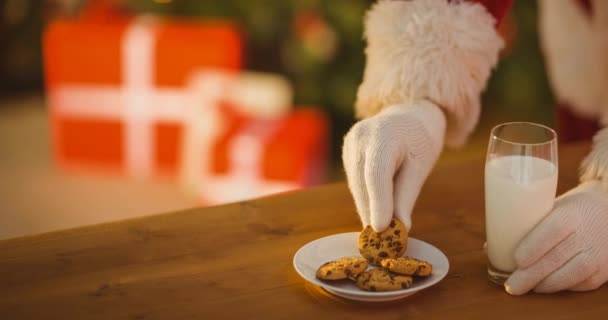 Animacja Mikołaja Ręka Biorąc Świąteczne Ciasteczka Talerza Boże Narodzenie Tradycja — Wideo stockowe