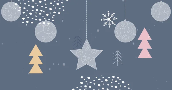 Weihnachtsschmuck Über Schnee Der Über Christbaumsymbole Auf Blauem Hintergrund Fällt — Stockfoto