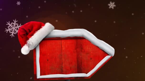 Анімація Снігу Падає Над Різдвяною Стрілкою Капелюхом Санти Клауса Різдво — стокове відео