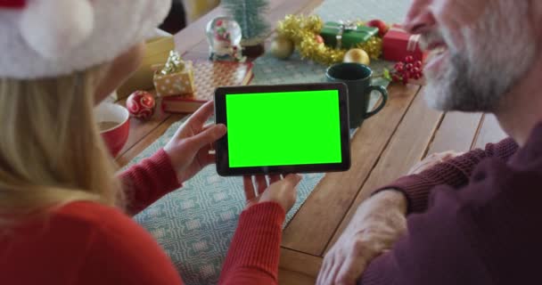 Smiling Caucasian Couple Santa Hats Making Tablet Christmas Video Call — Stock Video