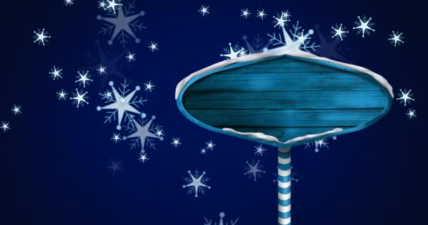 Animación Copos Nieve Navidad Cayendo Sobre Etiqueta Sobre Fondo Azul — Vídeos de Stock