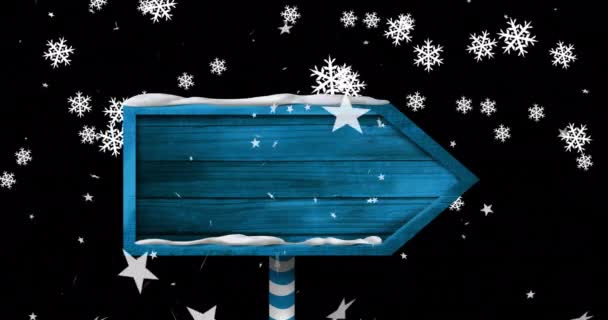 黒い背景に木の看板に落ちてくるクリスマスの雪片のアニメーション クリスマス お祝いのコンセプトをデジタルで — ストック動画