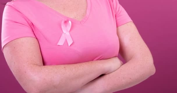 Video Midsection Caucasian Woman Crossed Arms Wearing Pink Cancer Awareness — Stock Video