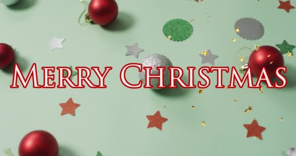 Animation Von Fröhlichen Weihnachtstexten Über Dekorationen Auf Hellgrünem Hintergrund Weihnachten — Stockvideo