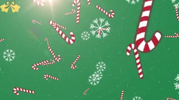 Animation Von Schnee Der Über Weihnachtsbonbons Auf Grünem Hintergrund Fällt — Stockvideo