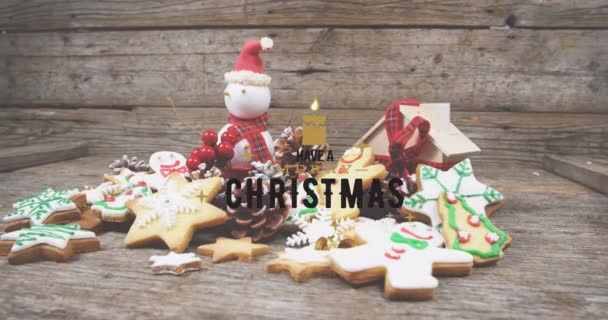 Κινούμενα Σχέδια Χαρούμενα Χριστουγεννιάτικα Κείμενα Πάνω Από Χριστουγεννιάτικα Μπισκότα Χριστούγεννα — Αρχείο Βίντεο