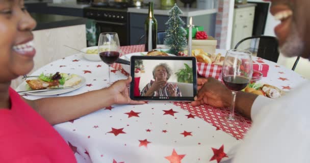 Smiling African American Couple Using Tablet Christmas Video Call Woman — Stok Video