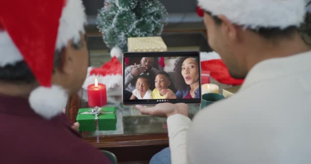Biracial Father Son Waving Using Tablet Christmas Video Call Family — Stock Video