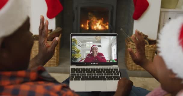 African American Couple Waving Using Laptop Christmas Video Call Woman — Stock Video