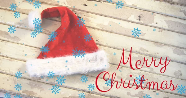 Image Merry Christmas Text Santa Hat Snow Falling Christmas Winter — Stock Photo, Image