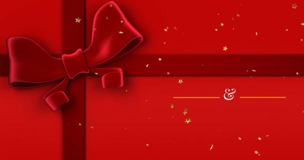 赤いリボンの上に陽気なクリスマステキストのアニメーション クリスマス 伝統とお祝いのコンセプトデジタルで生成されたビデオ — ストック動画