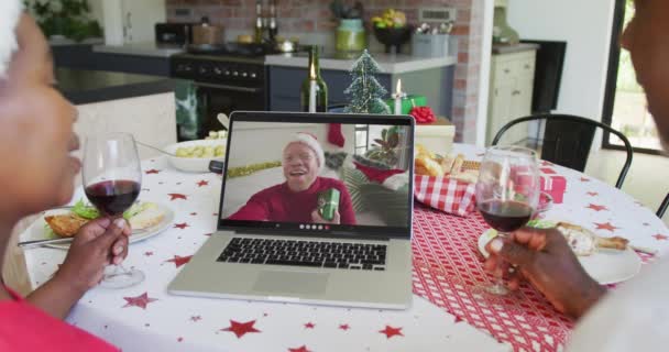 African American Couple Wine Using Laptop Christmas Video Call Happy — Stock Video