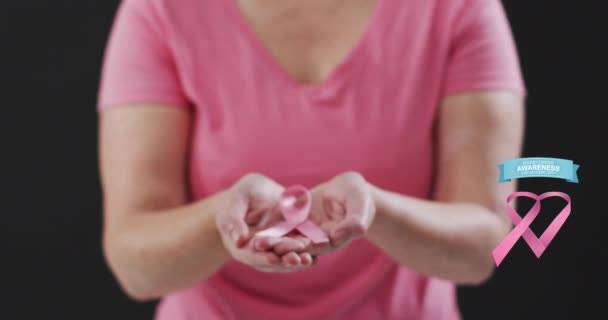 Breast Cancer Awareness Text Banner Mid Section Woman Holding Pink — Stock Video