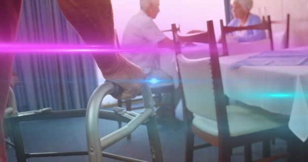 Animation Coloured Lights Moving Senior Man Dining Room Using Walking — Stock Video