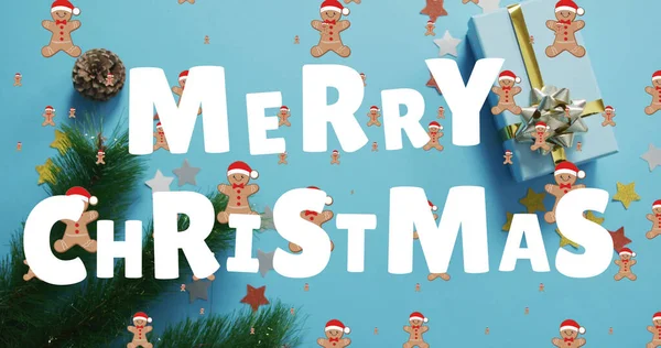 Kurabiyelerin Üzerinde Mutlu Noel Mesajı Mavi Arka Planda Süslemeler Noel — Stok fotoğraf