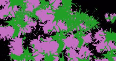 Siyah arka planda mor ve yeşil boya lekeleri. Uluslararası yaratıcılık ayı konsepti dijital olarak oluşturulmuş video.