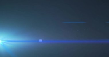 Lens flaşlı koyu arkaplanda mavi spot ışıklarının animasyonu. hareket, enerji ve ışık, soyut arayüz arkaplan kavramı dijital olarak oluşturulmuş video.