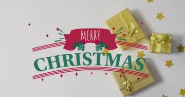 Yıldızlar ve hediyeler üzerine Mutlu Noeller metni. Noel, kış, gelenek ve kutlama konsepti dijital olarak oluşturulmuş video.