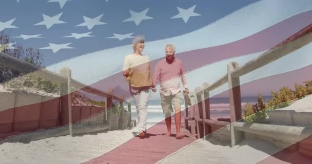 Animation Senior Caucasian Couple Holding Hands Beach Flag United States — Stock Video
