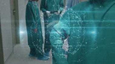 Yüz maskesi takan cerrahlarla bağlantılı bir dünya animasyonu. küresel tıp, sağlık hizmetleri ve dijital olarak üretilen video konsepti.
