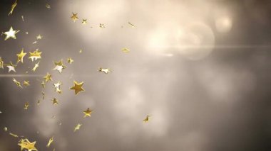 Işık noktaları ve bulutların üzerinde yüzen yıldızların animasyonu. Yılbaşı partisi kutlaması konsepti dijital olarak oluşturulmuş video.