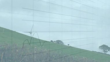 Rüzgar türbini üzerinde finansal veri işleme animasyonu. küresel iklim değişikliği, sürdürülebilirlik ve rüzgar enerjisi konsepti dijital olarak oluşturulmuş video.