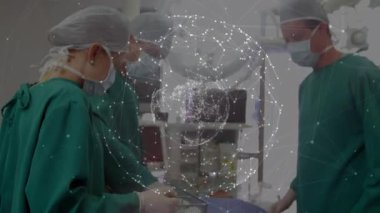 Ameliyathanelerdeki cerrahlar üzerinde bağlantı ağı olan bir dünya animasyonu. küresel tıp, sağlık hizmetleri ve dijital olarak üretilen video konsepti.