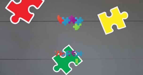 Animazione Autismo Consapevolezza Mese Pezzi Puzzle Colorati Che Formano Mano — Video Stock