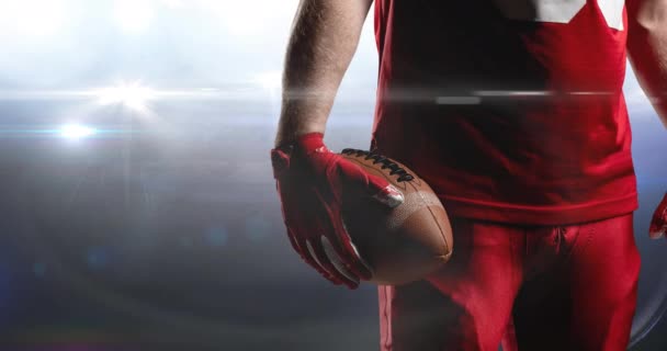 Animation Lights Midsection American Football Player Holding Ball Floodlit Stadium — Stock Video