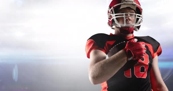 Animation Male American Football Player Holding Ball Lens Flare Floodlit — Stock Video