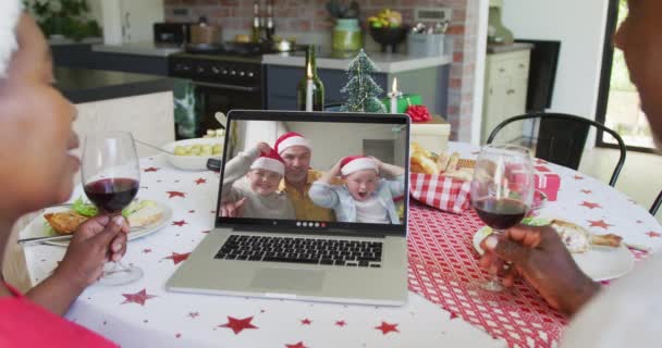 African American Couple Wine Using Laptop Christmas Video Call Happy — Stock Video