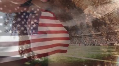 Afro-Amerikan kadın ve spor stadyumu üzerinden Amerika Birleşik Devletleri bayrağının canlandırılması. Amerikan tarihi, vatanseverlik ve bağımsızlık kavramı dijital olarak oluşturulmuş video.