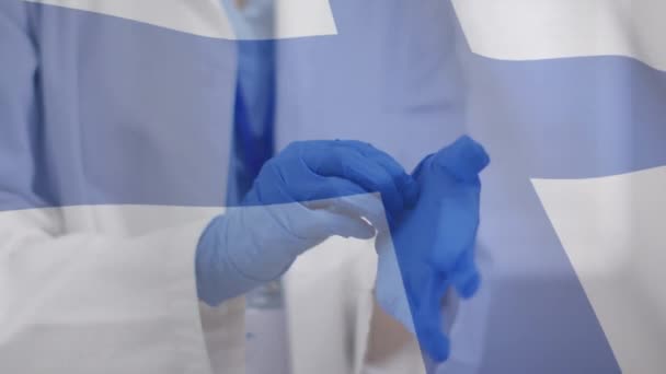 Animering Finlands Flagga Med Manliga Läkare Som Tar Sig Kirurgiska — Stockvideo