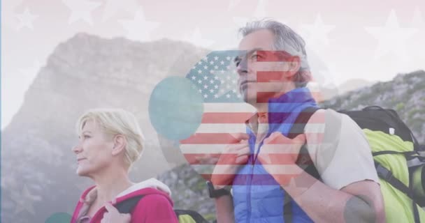 Animation American Flag Senior Caucasian Couple Hiking Mountains Patriotism Celebration — Stock Video