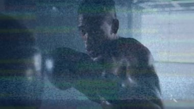 Afrika kökenli Amerikalı erkek boksörün spor salonunda yumruk atması olayına müdahale. global sporlar, sağlıklı yaşam tarzı ve dijital arayüz konsepti dijital olarak oluşturulmuş video.