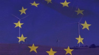 Dönen rüzgar türbinleri üzerinde Avrupa Birliği bayrağının canlandırılması. Avrupa Birliği enerji ve ekonomi kavramı dijital olarak üretilen video.