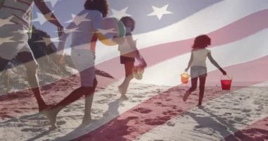 Amerika Birleşik Devletleri bayrağının Afrika kökenli Amerikan ailesinin kumsaldaki canlandırması. Amerikan tarihi, vatanseverlik ve bağımsızlık kavramı dijital olarak oluşturulmuş video.