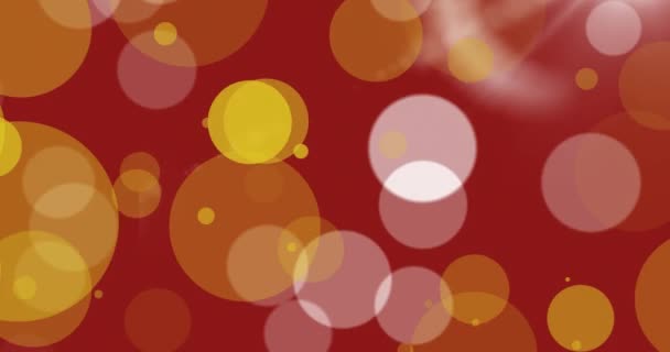 红色背景上发亮的黄斑的动画 光色概念数字生成的视频 — 图库视频影像